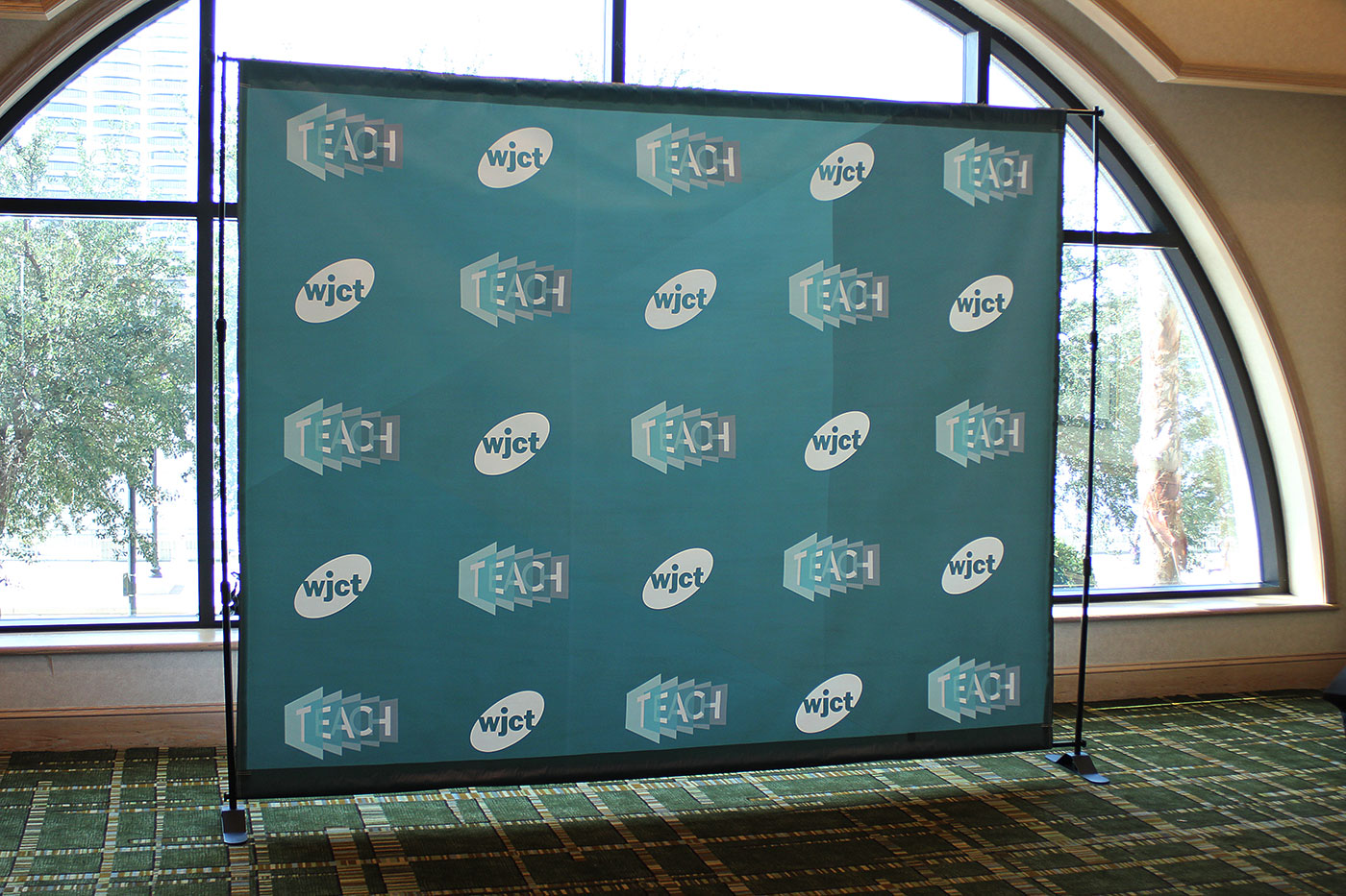 TEACH Conference step-and-repeat photo backdrop